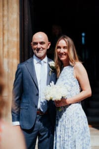 Bride and Groom standing outside winchester registry office