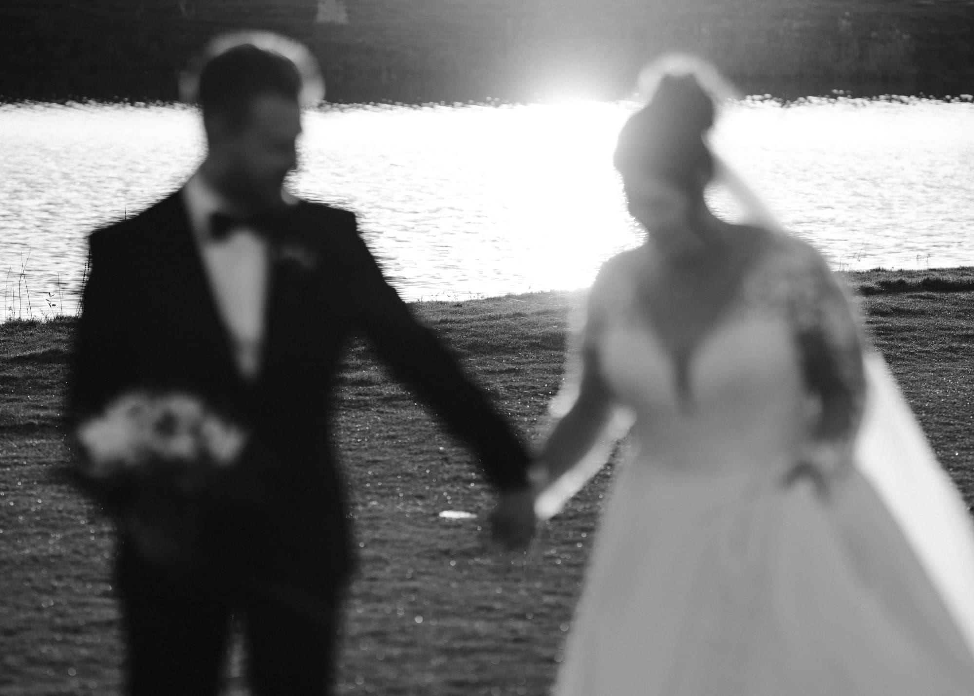 Bride and groom walking at golden hour